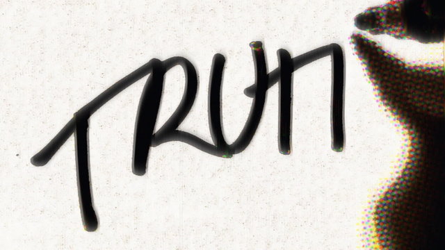 Writing the Word TRUTH on Paper