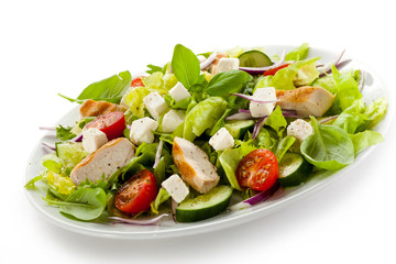 Vegetable salad with white cheese and roast chcicken meat