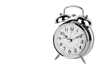 Alarm clock. Old-fashioned style silver alarm clock