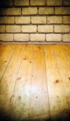 Vintage brick wall and wooden floor