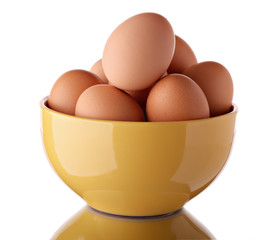 group of eggs in a ceramic bowl