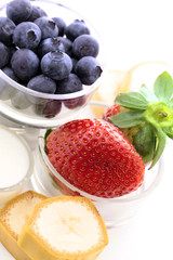 Fresh blueberries, strawberries and bananas