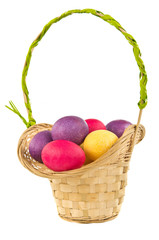 Easter Basket with colored eggs isolated on white