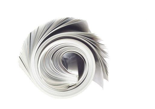 rolled up newspaper, isolated on white background, free copy spa