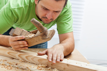 Man working with wood