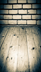 Vintage brick wall and wooden floor