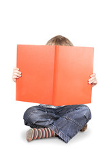 boy reading a big book