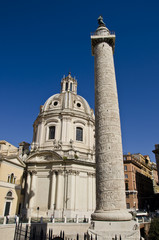 Fototapeta na wymiar Trajan's Column and church in Rome, Italy
