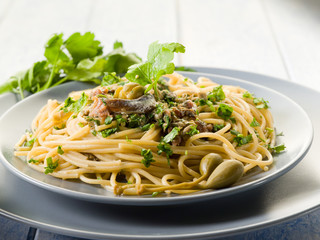 spaghetti with anchovies parsley and capers