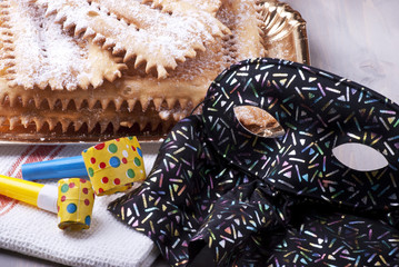 dolci e maschera di carnevale