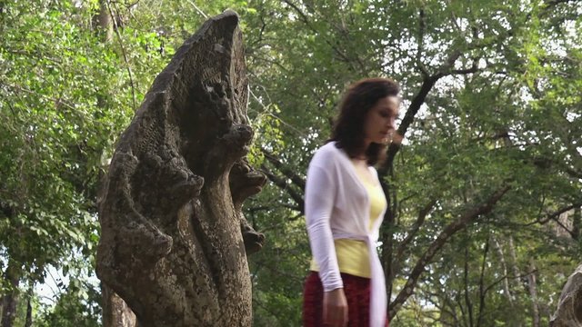 Female tourist walking inside Beng Mealea temple, Cambodia, Asia