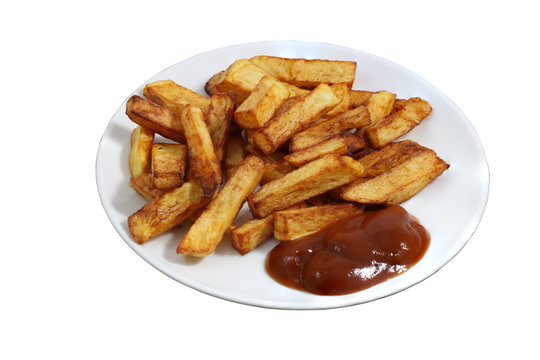 Plate of fried French fries with bright red sauce