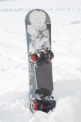 Snowboard in snow