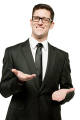 Handsome businessman in black suit on white.