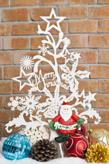 White see through Christmas tree with Santa and balls