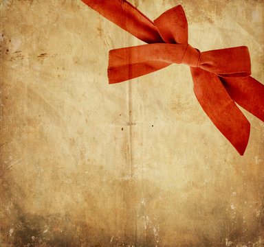 Vintage paper with red bow