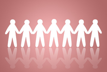 team of paper people on pink background