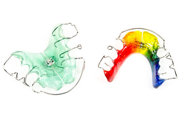 grüne und bunte Zahnspangen (Draufsicht) © Michael Tieck