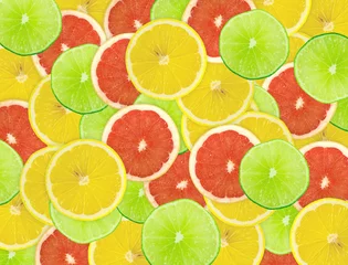 Rolgordijnen Abstracte achtergrond van citrusvruchtenplakken. Detailopname. Studiofoto © oly5