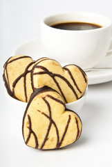 cup of coffee and cookies with chocolate