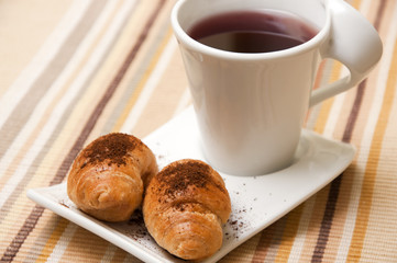 Tea and mini croissants