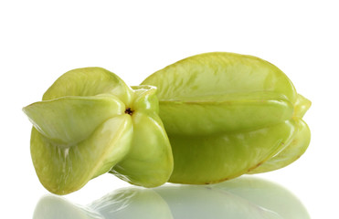 two fresh carambola fruits isolated on white