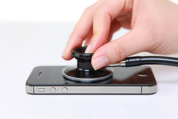 doctor examines a smart phone