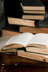 opened book, lying on the bookshelf