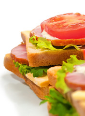 Ham sandwich with cheese, tomatoes and lettuce