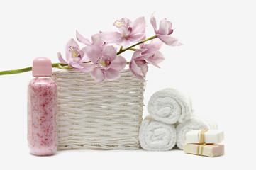 Obraz na płótnie Canvas bath accessories in the basket. With towels with handmade soap