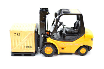 Forklift Truck Carrying A Crate