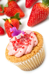strawberry cupcake with candle