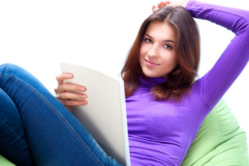 Young adult woman using her tablet computer