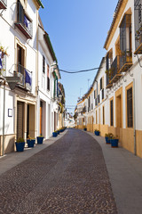 Fototapeta premium Typical street in Cordoba's downtown, Spain