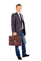 young business man holding briefcase in hand