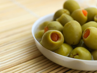 green olives on the white plate