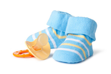 Blue baby socks and pacifier