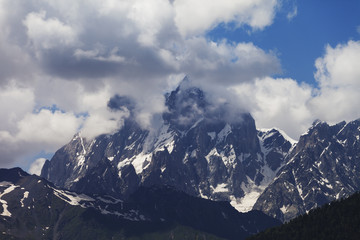 Obraz premium Mt. Ushba in clouds, Caucasus Mountains, Georgia.