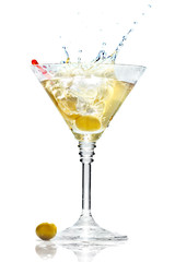 Olive splashing on martini glass isolated