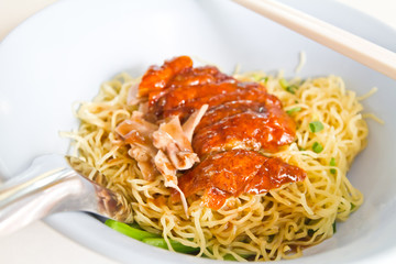 Grilled duck with yellow noodle