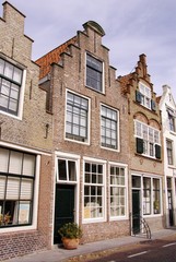 Fototapeta na wymiar Historic fishermaen houses in Zierikzee in the Netherlands