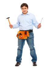 Portrait of construction worker with hammer and screwdriver