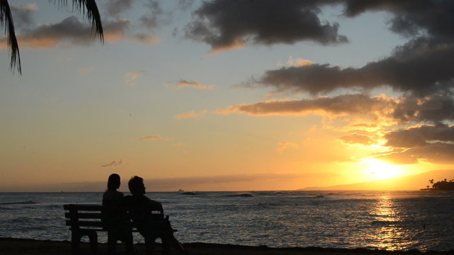 Romantic Couple At Sunset By The Beach