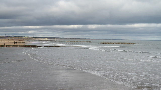 waves breaking and Aberdeen beach Scotland
