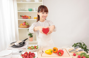 Woman cooking in kitchen