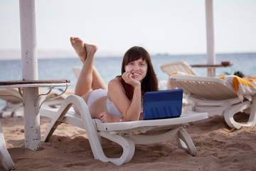 woman  with laptop at resort