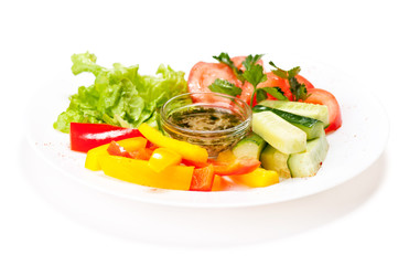 Fresh summer salad on white plate