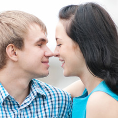 Portrait of a beautiful young happy smiling couple