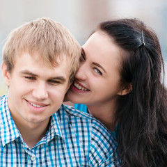 Portrait of a beautiful young happy smiling couple