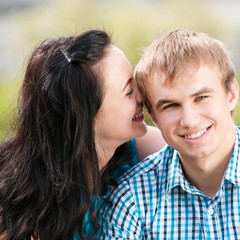 Portrait of a beautiful young happy smiling couple